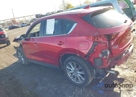 2021 Mazda Cx-5 Grand Touring z USA, uszkodzony, nr VIN JM3KFBDM6M1312394